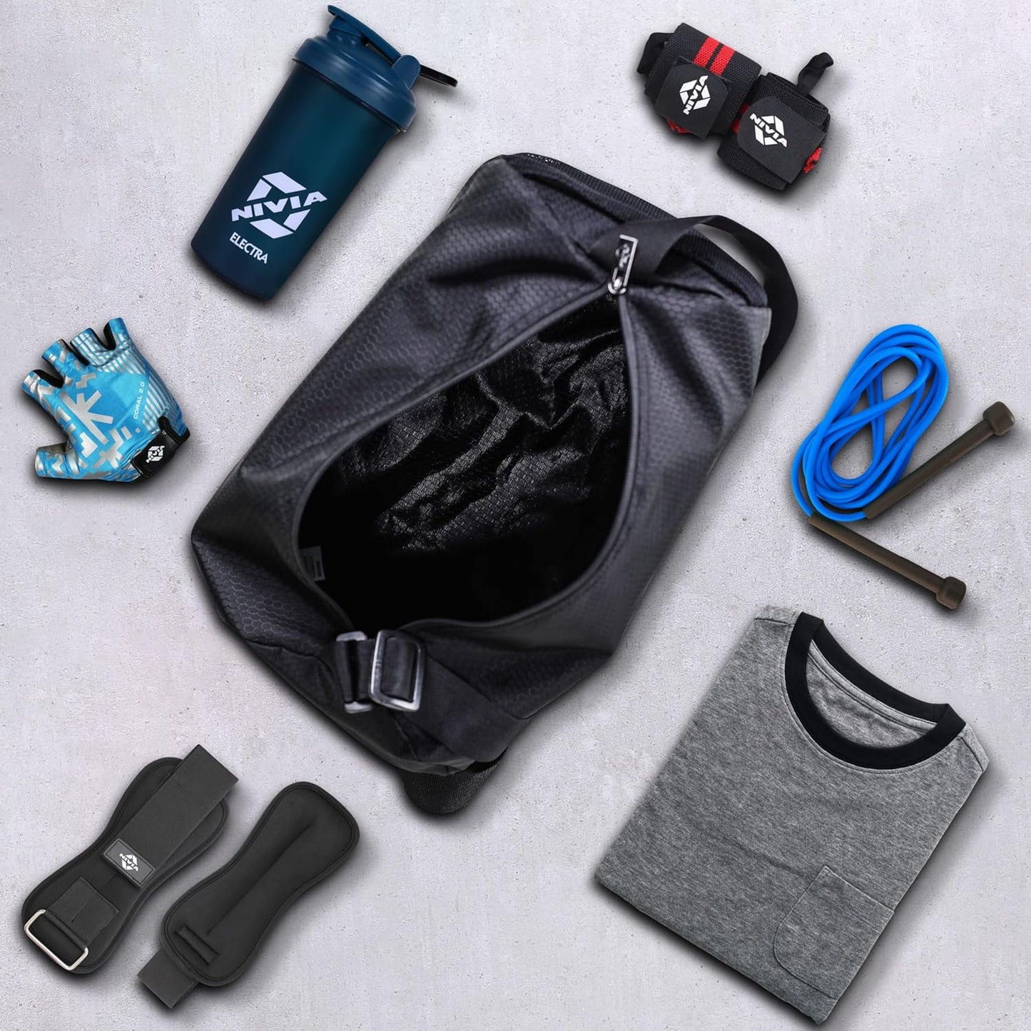 Nivia Basic Duffle Bag | Polyester (Black, 12 Litre) Gym Bags | Adjustable Shoulder Bag | Fitness Bag | Carry Bags | Sports & Travel Bag | Sports Kit Bag | Men & Women